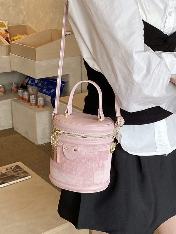 Bolsa de cilindro coreana de diseño popular de nicho 2026 nueva moda simple de hombro portátil bolso de cubo