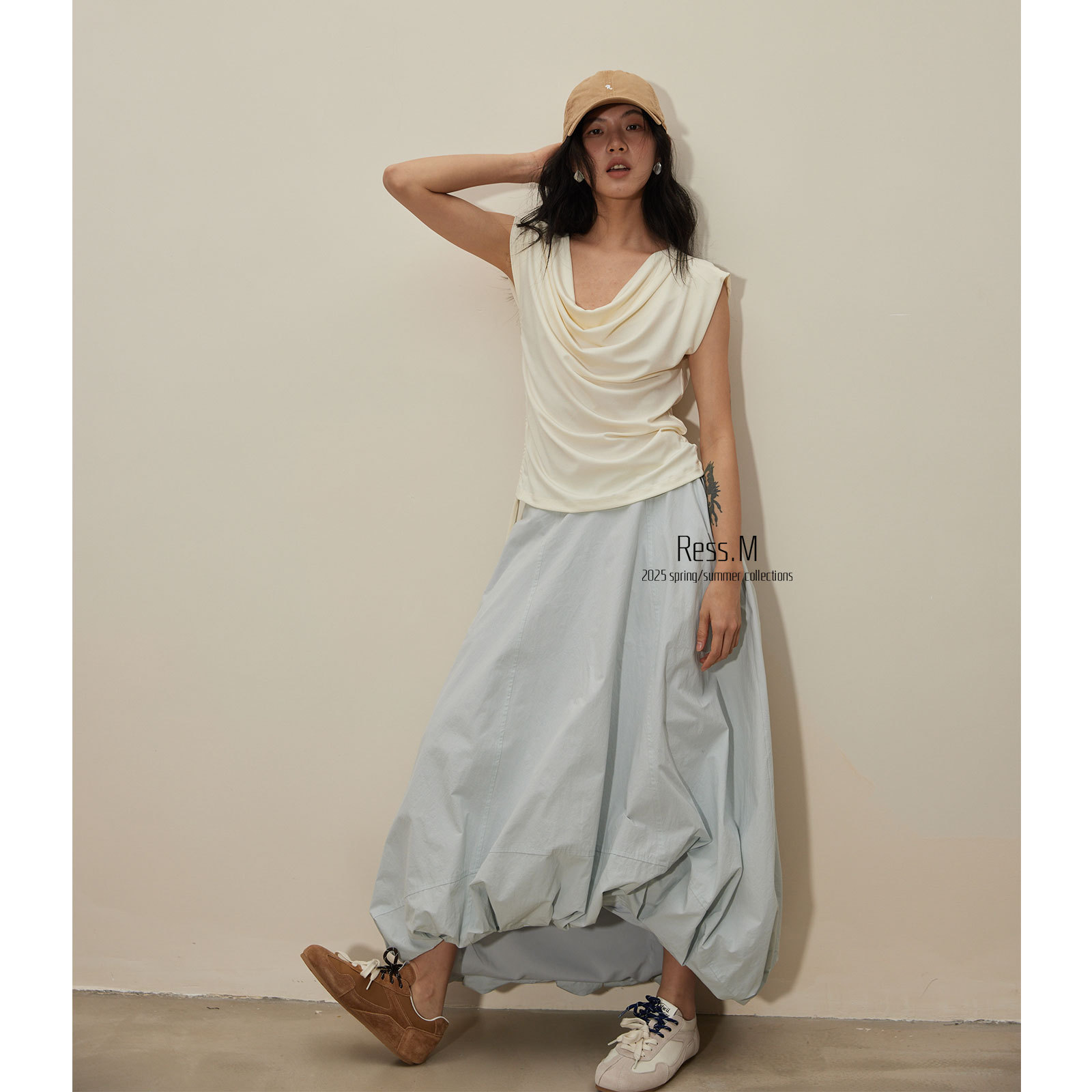 Ress.M十三行のきわめてシンプルな半身のスカートのカジュアルさはつぼみのつぼみのスカートの不規則な小さい大衆の傘のスカートの子供ではありません。