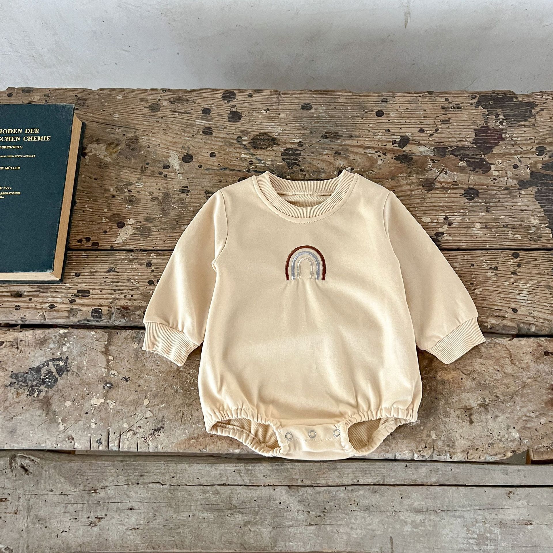 INS estilo coreano bebé niños y niñas suéter de algodón Arco Iris bordado mono mameluco recién nacido mameluco suelto moda