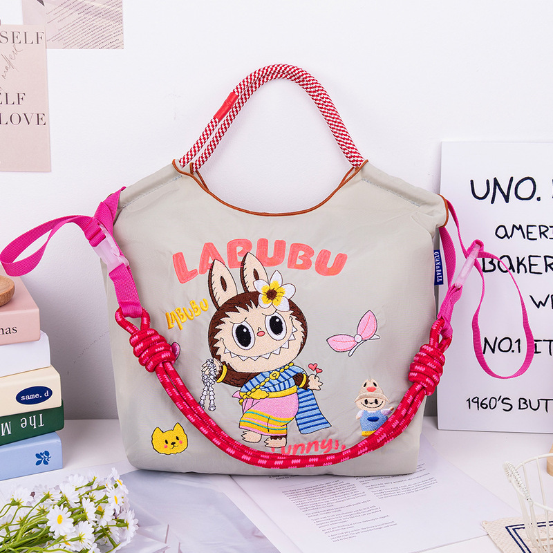 [アップグレードジッパーバッグ] 2025 新しい刺繍ナイロン屋外防水日本製多用途調節可能なクロスボディバッグ女性用|undefined