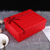 Handheld red gift box with bow, Birthday gift