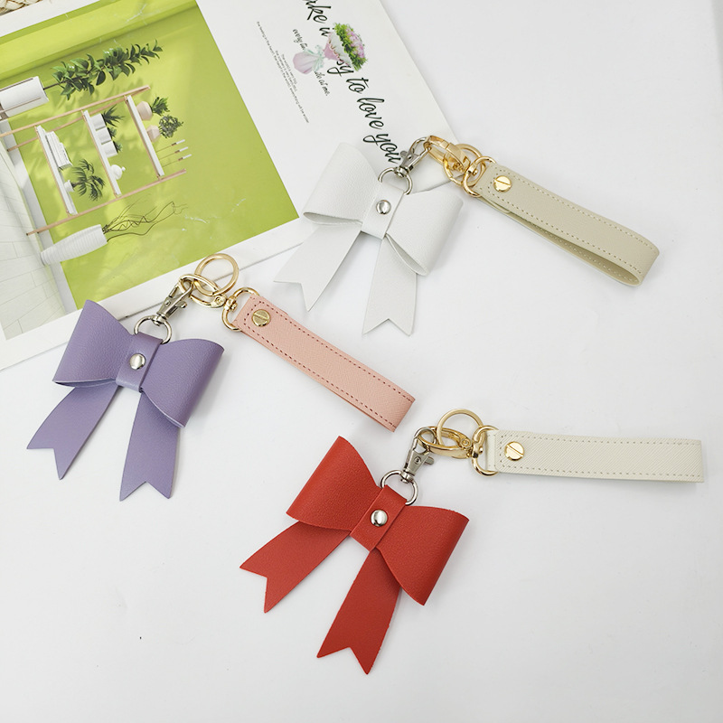 Spot Leather Bow Pendant Cross Pattern Leather Keychain Portable Wrist Strap Key Leather Rope Bag Pendant