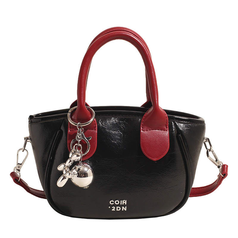 Alta sensación de contraste bolsos pequeños para mujeres 2024 nuevo verano popular bolsa de mensajero versátil Super Fire bolsa de cubo de mano