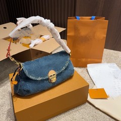 25新型カウボーイ丹寧中古脇下包小元宝法棒包