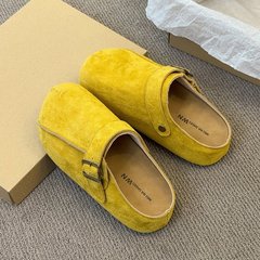 包頭の外は半引きボケン靴を履いています。女性は2025年の春の新型ファッションをしています。