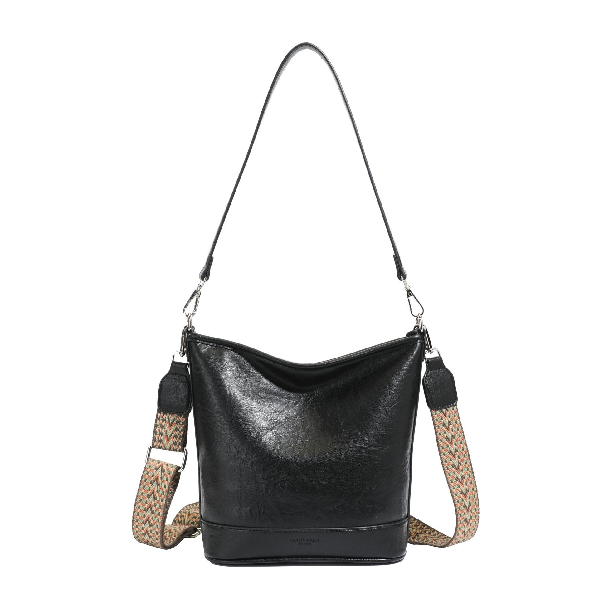 Bolso de cuero suave retro transfronterizo para mujeres otoño / invierno 2025, nuevo estilo universal bolso de hombro de brazo, bolso de cubo de transporte casual