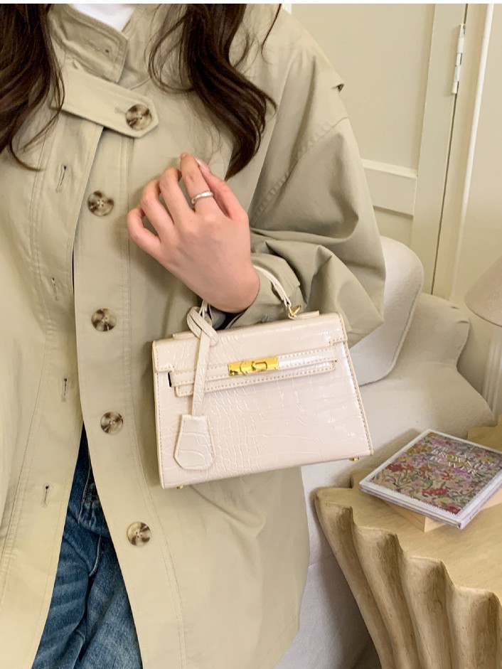 Bolso de mano caliente para mujeres 2025 nuevo estilo transfronterizo de alto nivel con patrón de cocodrilo lujoso y versátil bolso de hombro