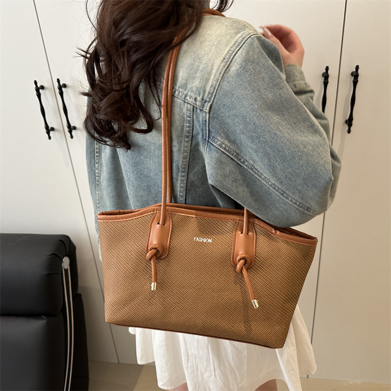 Bolso de viaje portátil primavera / verano para mujeres 2025 nuevo bolso de moda, bolso de hombro de gran capacidad, bolso de mujer de alta calidad