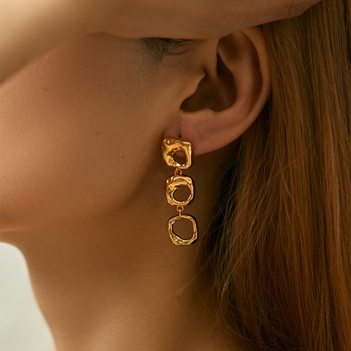 Irregular hollow design niche heavy industry metal high-end feel earrings brass plated 18K gold color retaining long earrings