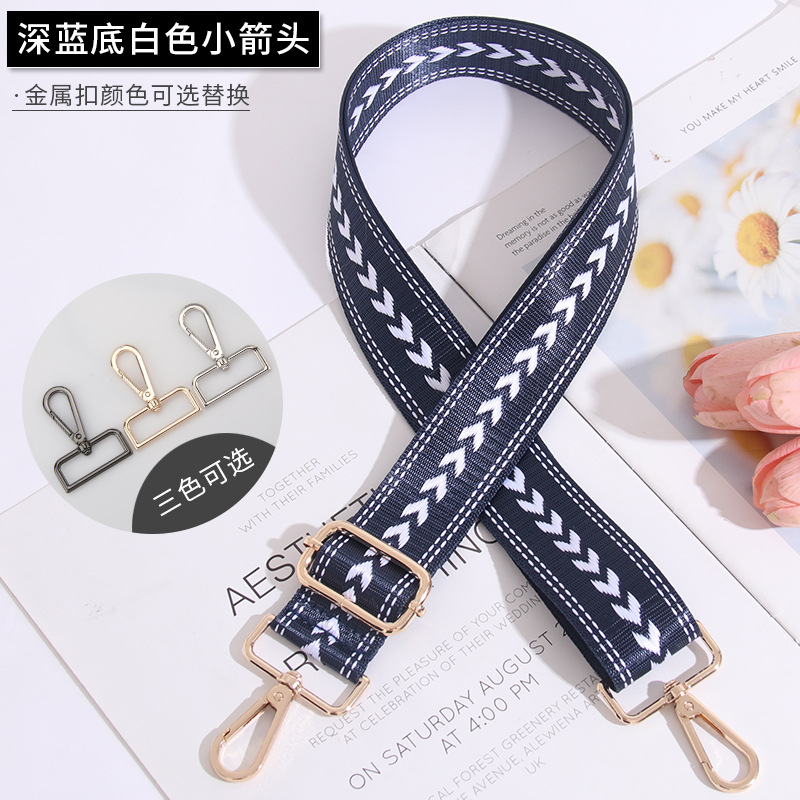Small white arrow on dark blue background