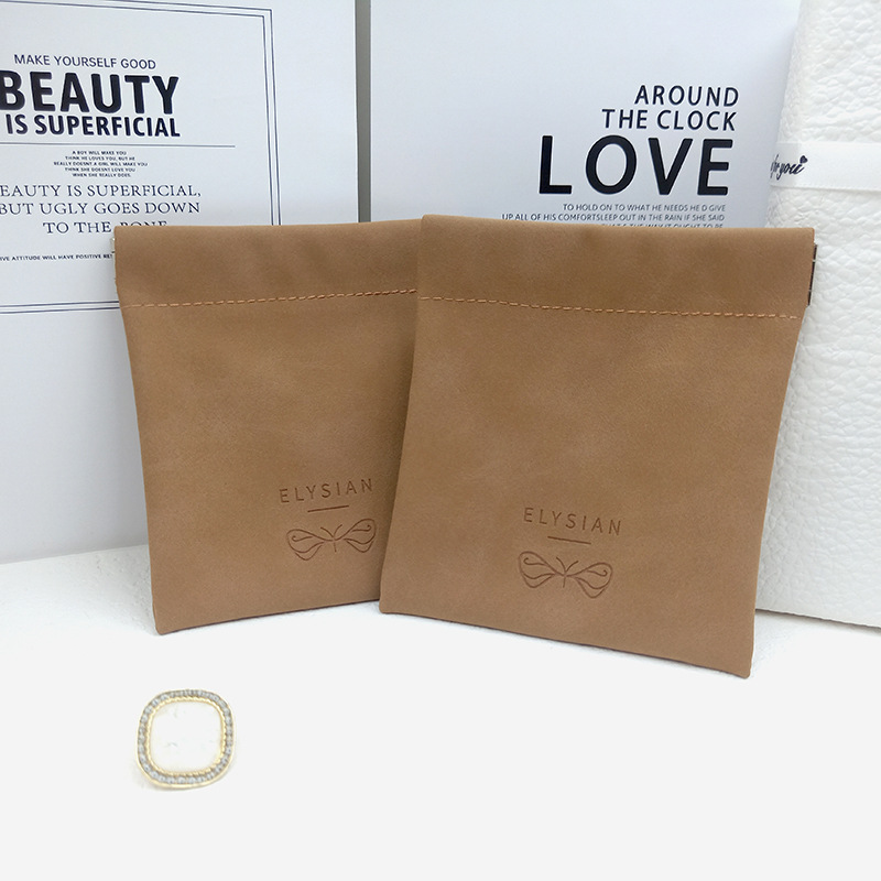 环保多功能羊巴革弹片袋卡片零钱珠宝首饰香水口红自动闭合收纳袋