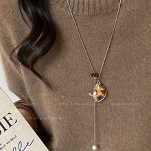 可爱摇摇木马串珠项链秋冬轻奢高级感虎眼石可调节长款毛衣链配饰