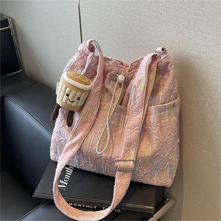 Alto sentido de la bolsa de lona de transporte casual versátil2024 nuevo bolso de mujer de verano popular gran capacidad bolso de cubo