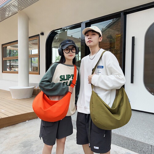 Crossbody bag for women  new large-capacity dumpling bag for college students, large size for male couples, lightweight solid color casual bag