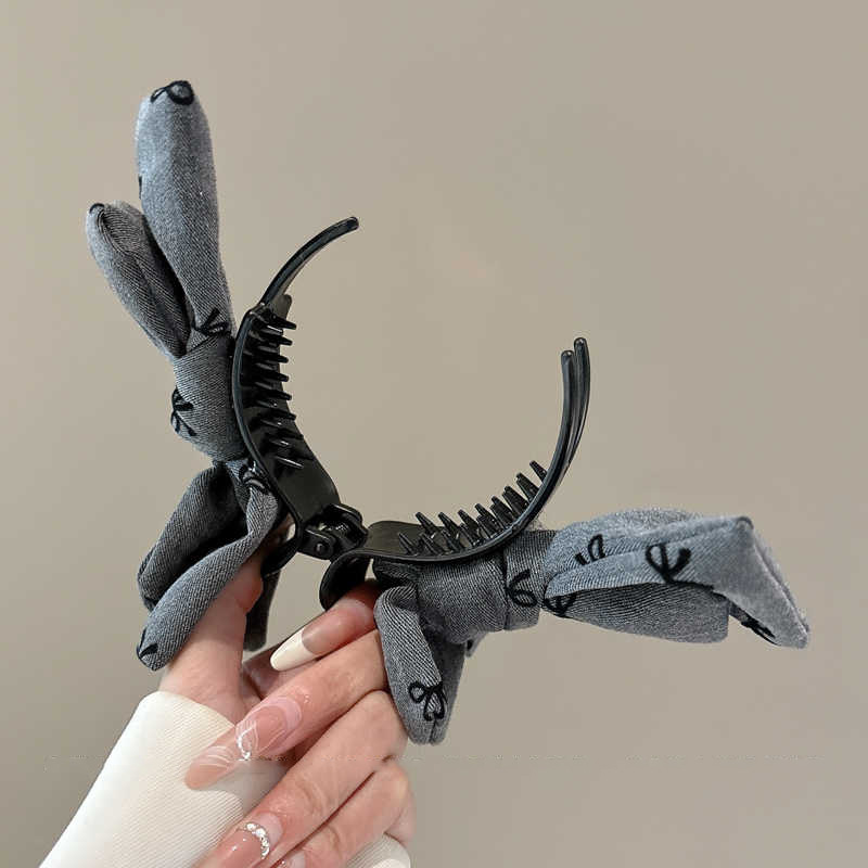 Bow Ball clip para el cabello de mujer alta sensación de disco de cabello alto clip de agarre de cola de caballo 2024 nuevo diseño elegante tocado