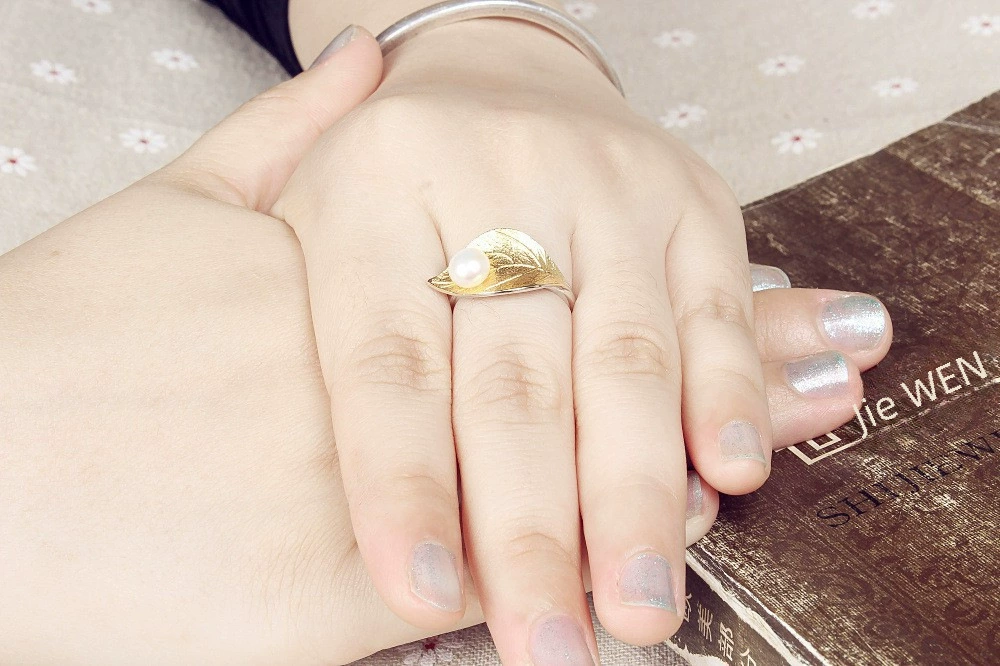 One size fashionable ring from pearl, silver 925 sample