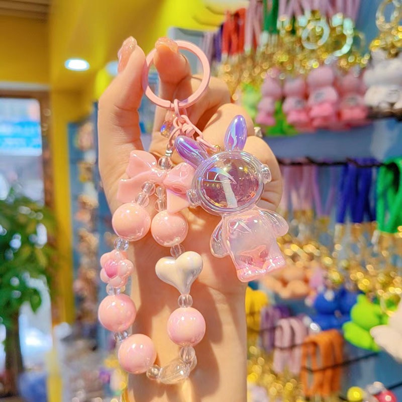 Auriculares de perlas conejo - polvo púrpura