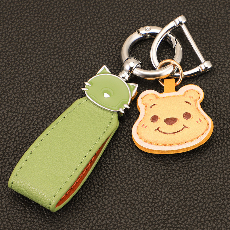 Macaron color gato cuerda de mano llavero de coche colgante de oso de fresa colgante de llavero de oso de cuero de alta calidad colgante de llavero de oso Pooh