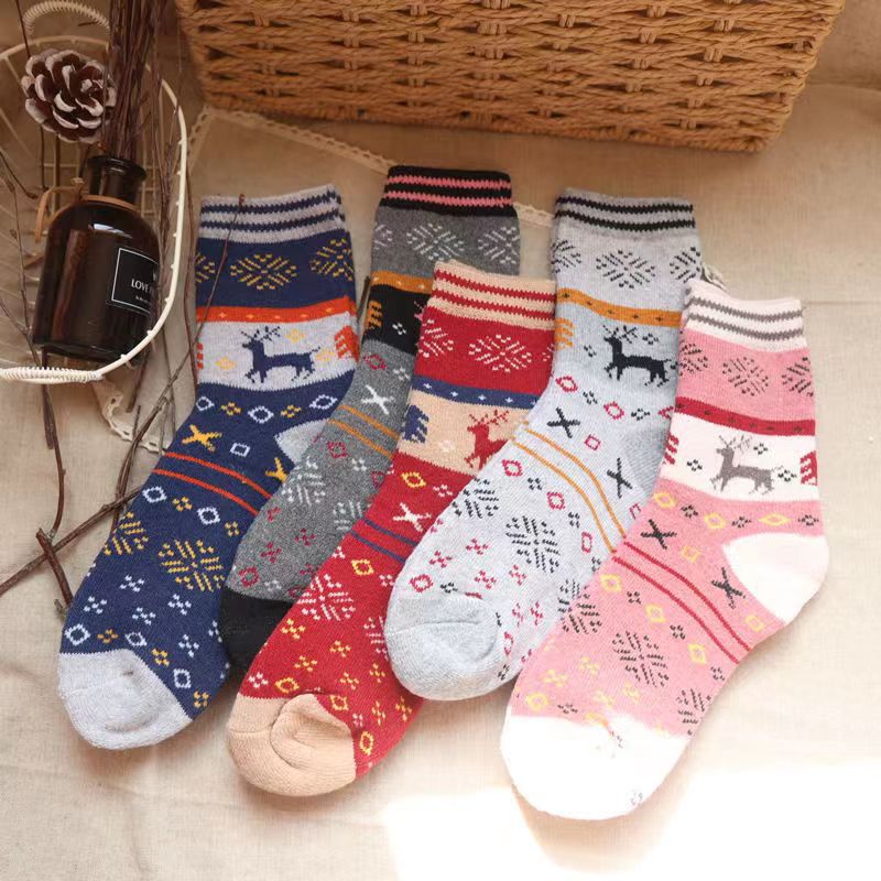 Calcetines de invierno cálidos para hombres y mujeres a juego con flores cruzadas engrosadas a media pantorrilla Calcetines de lana de ciervo a rayas al por mayor