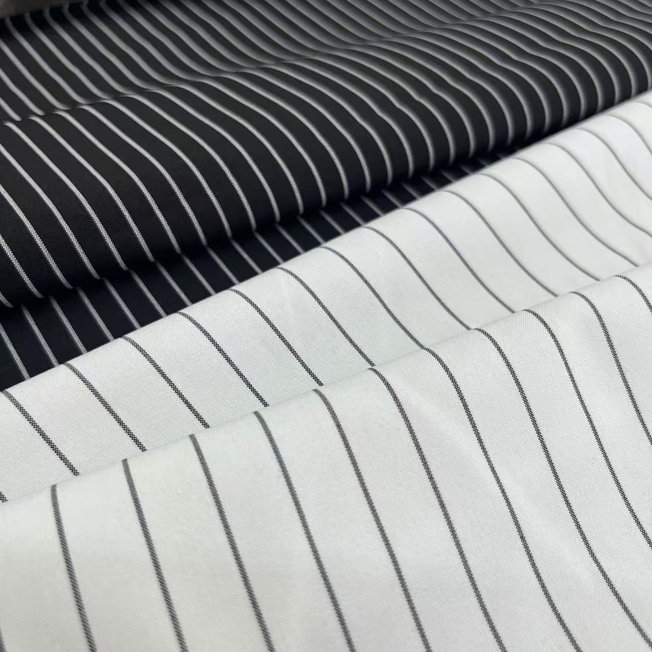 厂家直供竖条纹阳离子涤纶提花四面弹超柔衬衫T恤西装面料 四面弹