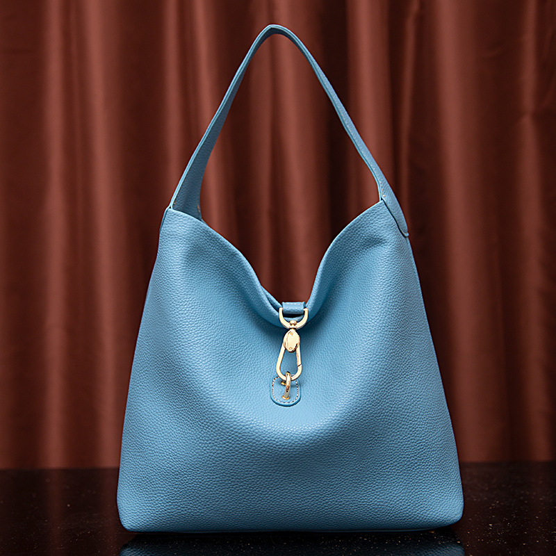 Neue handgehaltene Damen-Tasche mit körnigem Kieselmuster und einer Schulter unter dem Arm_voghion.com