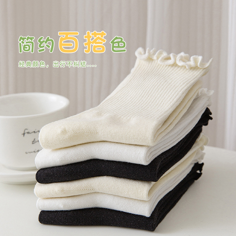 Calcetines de primavera y otoño calcetines de media pantorrilla calcetines de algodón de estudiante calcetines de piso de color sólido calcetines de mujer dulce calcetines de mujer calcetines de pila mujeres al por mayor