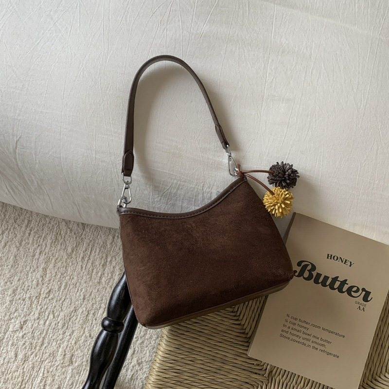 Transfronterizos retro gamuz bolsas portátiles bajo las axilas mujeres 2025 otoño y invierno nueva moda coreana de viaje al trabajo bolsas de hombro inclinadas