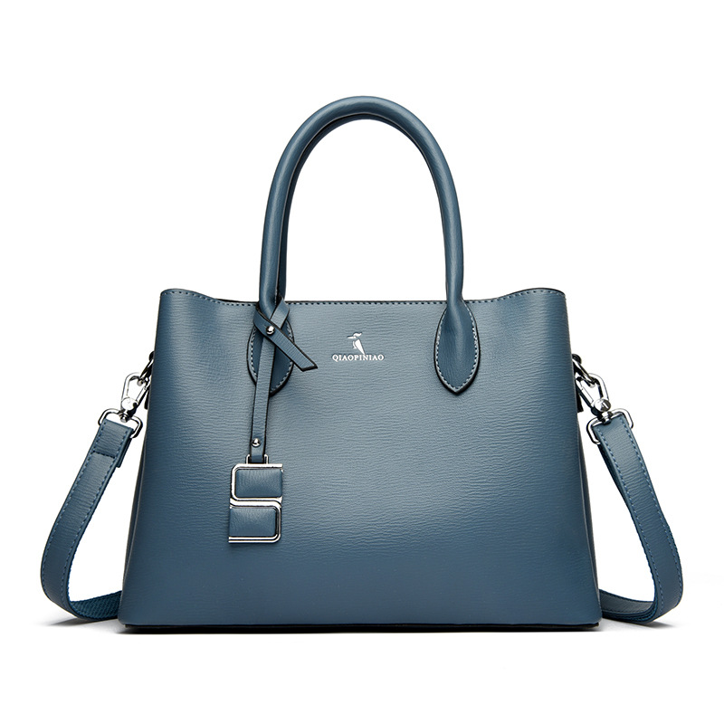 Nuevo bolso de mujer simple de moda, bolso de mano de cuero suave de gran capacidad, bolso de tela de mujer, bolso de canguro