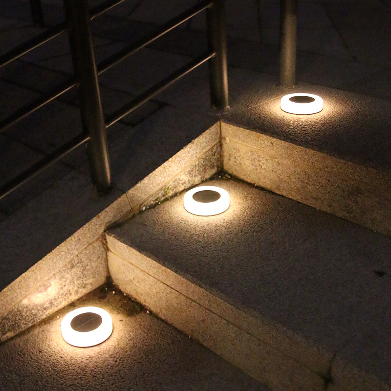 Solar-powered underground lights for courtyard, garden, and outdoor settings — LED, waterproof, ideal for villa decoration and lawn lighting.