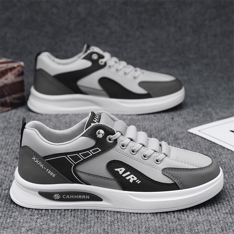 Zapatos de moda para estudiantes de skate de fondo plano de altura baja zapatos de hombre 2025 primavera nuevos zapatos de moda deportivos casuales de cuero para hombres