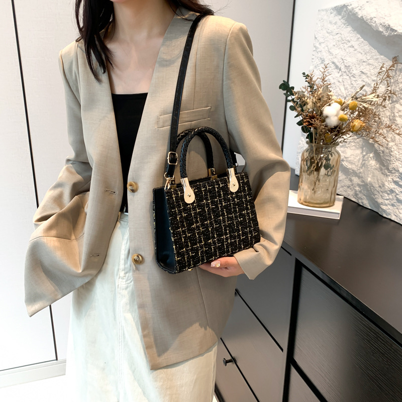 Diseño de tela de tela portátil Daffy bolso para mujeres 2024 nueva moda primavera y verano bolso de hombro