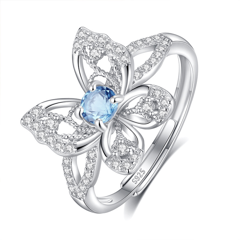 Transmisión en vivo de alta calidad tesoro de color estilo caliente s925 con incrustaciones de plata de ley anillo de mariposa de cristal natural moda femenina todo fósforo temperamento joyería