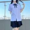 Shirt, mini-skirt, bow tie