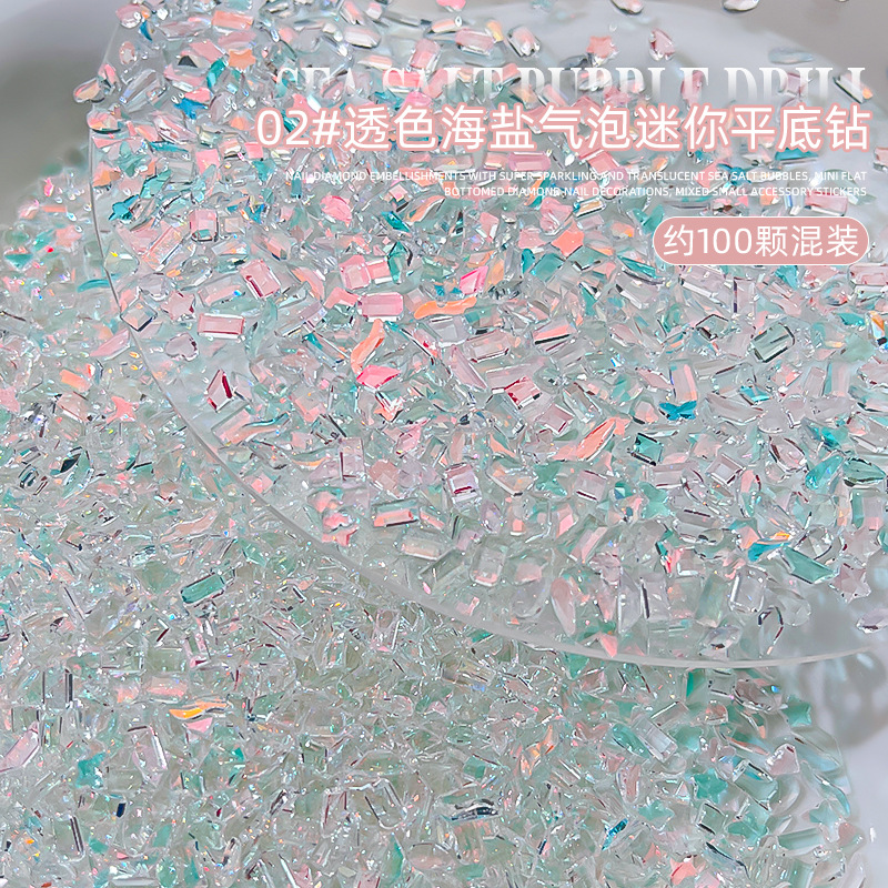 Popular en línea popular sal de mar burbuja arte de uñas diamante en forma especial tamaño pequeño color de fondo transparente Aurora mezclado joyería de uñas al por mayor