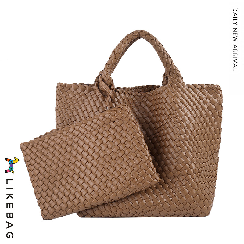 Bolso de mano de viajero de negocios transfronterizo bolso de mano de gran capacidad tejido PU 2022 nueva moda casual tejida Madre y niño bolsa