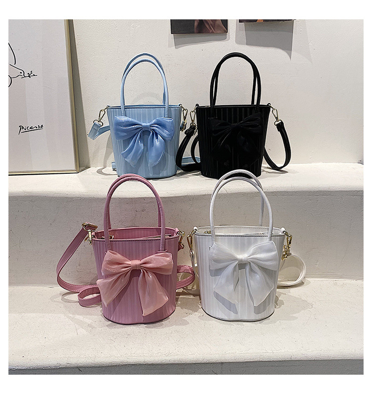 2022 New Fashion Solid Color Bow Portable Shoulder Crossbody Bucket Bag display picture 1