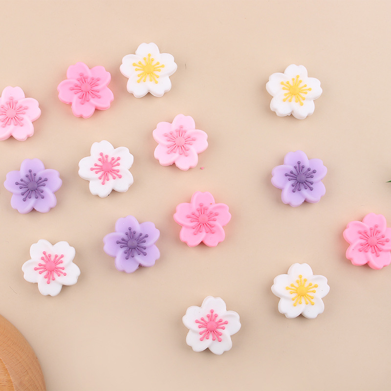 Productos creativos para bebés de bricolaje, flores de begonia, joyas de silicona, chupetes, accesorios de pulsera de mordedor de cadena anti-caída