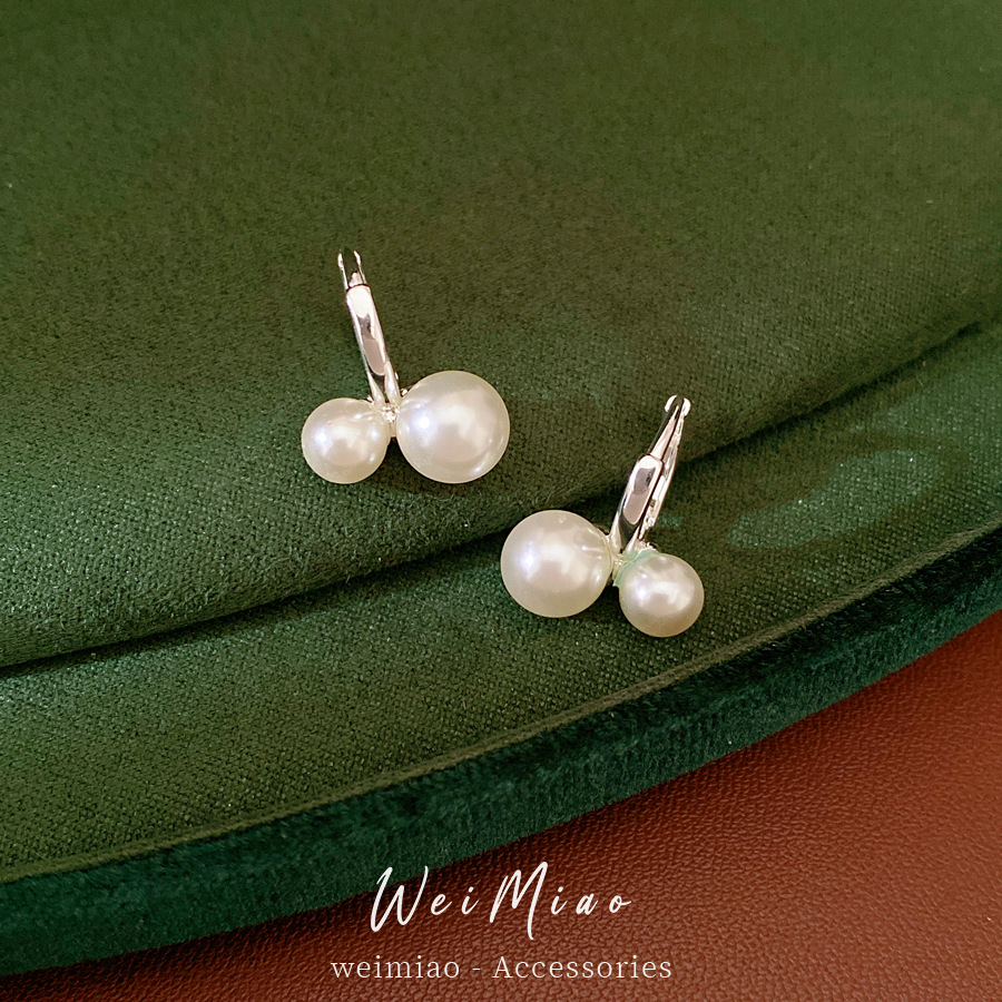 Elegante simple geometría perla aretes de perlas redondas temperamento frío aretes de aretes ligeros de lujo alta sensación de aretes al por mayor