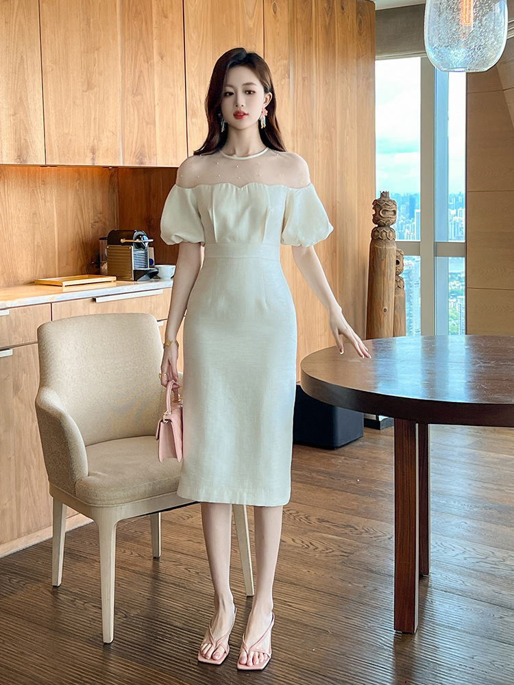Đầm dự tiệc maxi nữ tay phồng thắt eo kiểu dáng thanh lịch — Màu kem