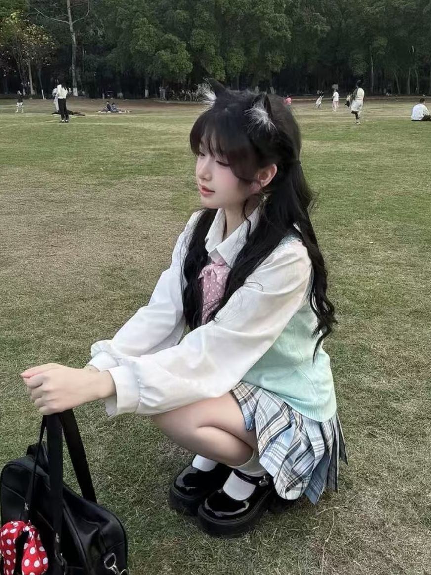오리지널 일본 JK 유니폼 새로운 스타일의 느슨한 파란색 격자 무늬 스커트 대학 스타일 풀오버 조끼 여자 학교 섹시한 부드러운 소녀 정장