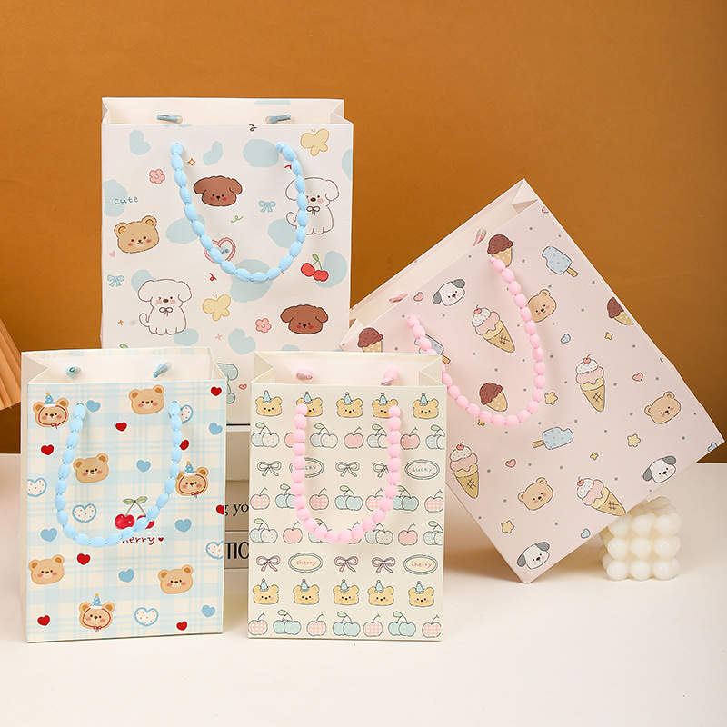 Nuevas bolsas de regalo exquisitas con diseño de animales de dibujos animados en relieve con cuerda de burbujas, directamente del fabricante, para el Día de la Mujer y San Valentín.