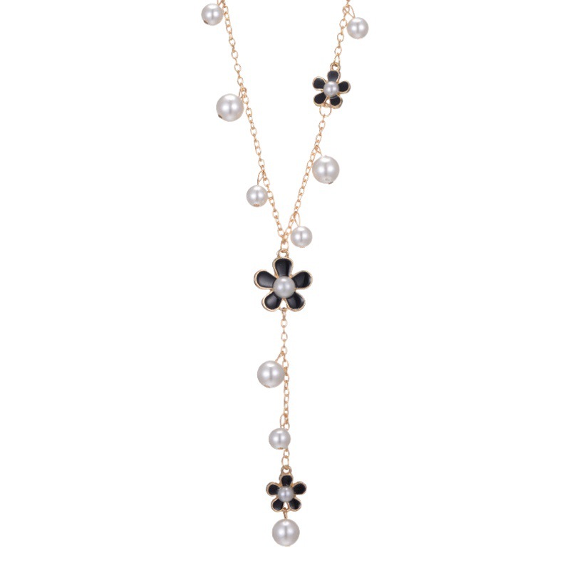 Estilo coreano moda de alta calidad borla larga cadena de suéter de flores de cinco hojas Otoño e Invierno simple collar de borla de todo fósforo joyería femenina