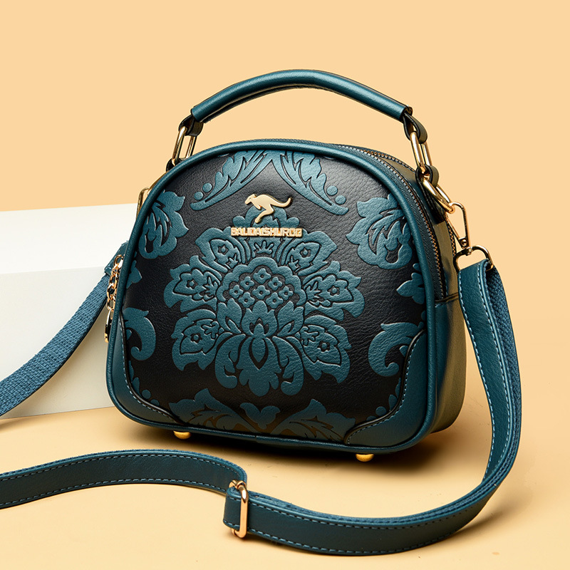 Bolso transfronterizo bolso de mujer 2023 Verano y otoño nuevo pequeño bolso redondo en relieve casual hombro crossbody bolso portátil mamá