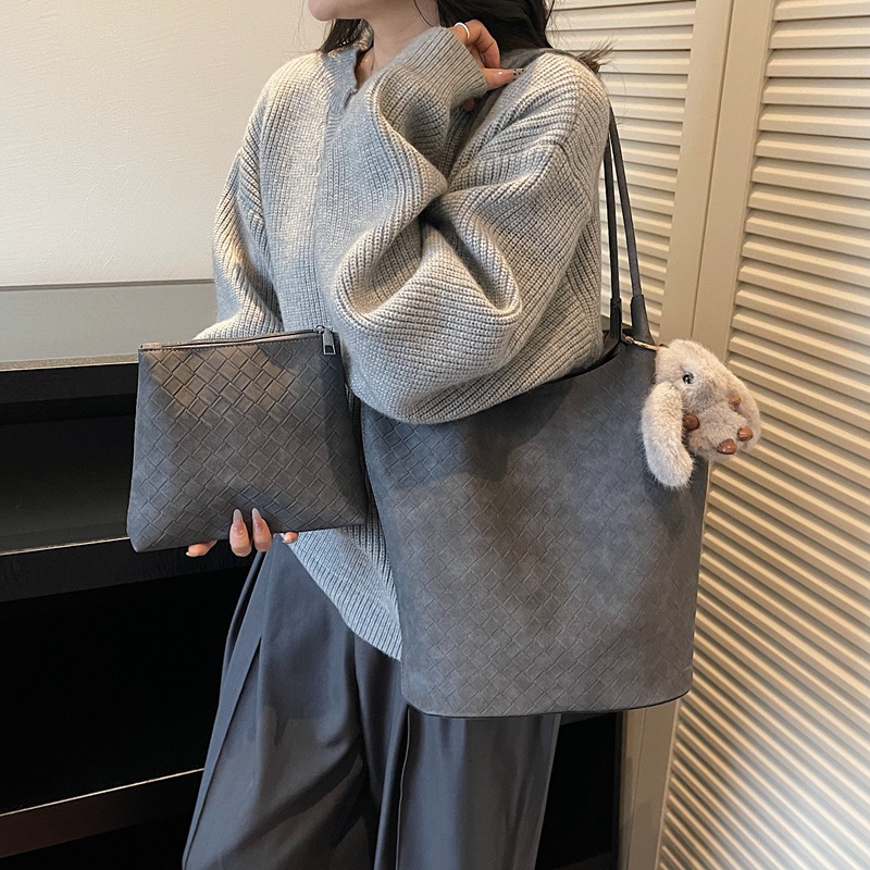 2025 nuevo bolso de mujer coreano retro bolso de cubo de mano nicho bolso de tejido de gran capacidad de viaje de hombro bolso de madre