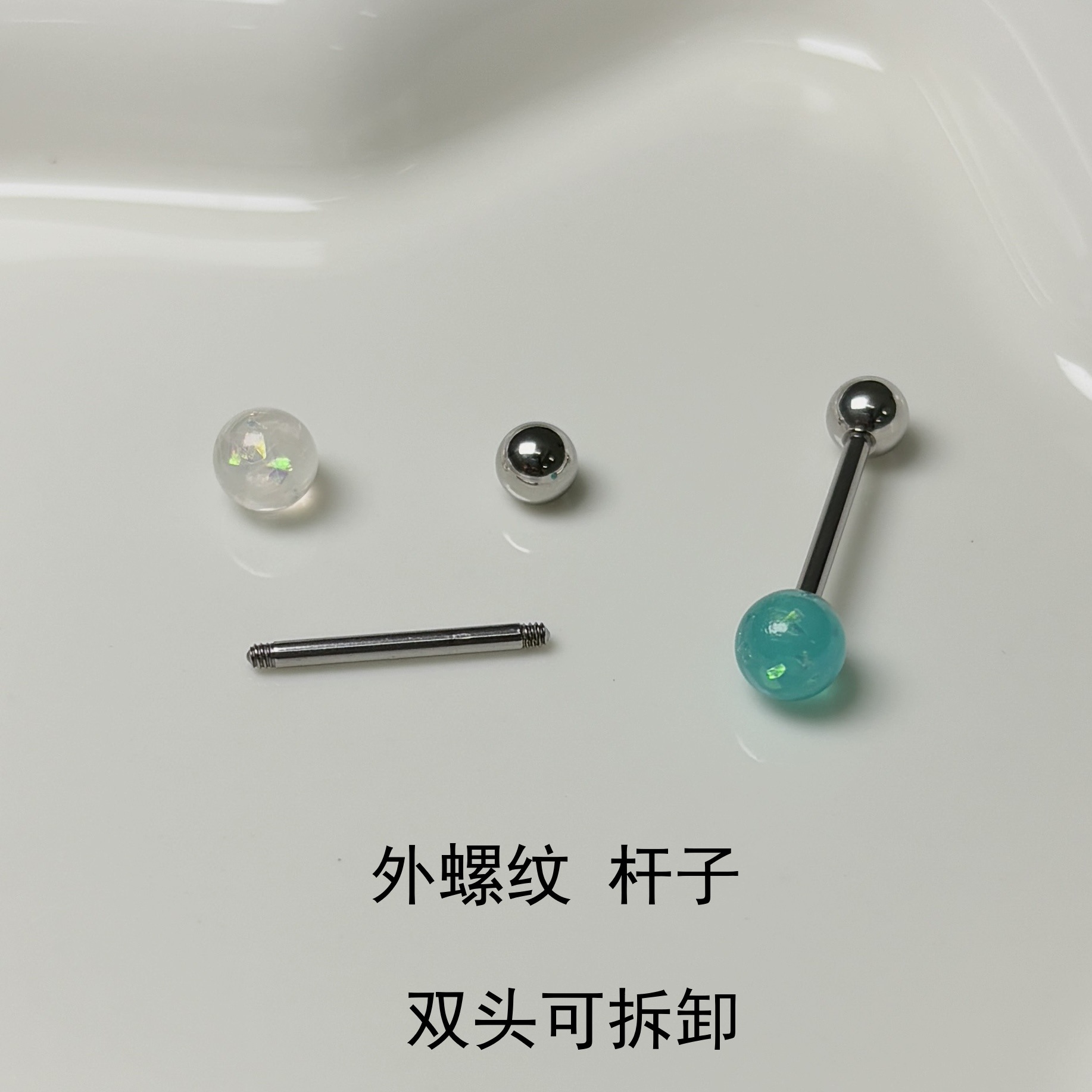 Silver pointed spike labret stud material detail