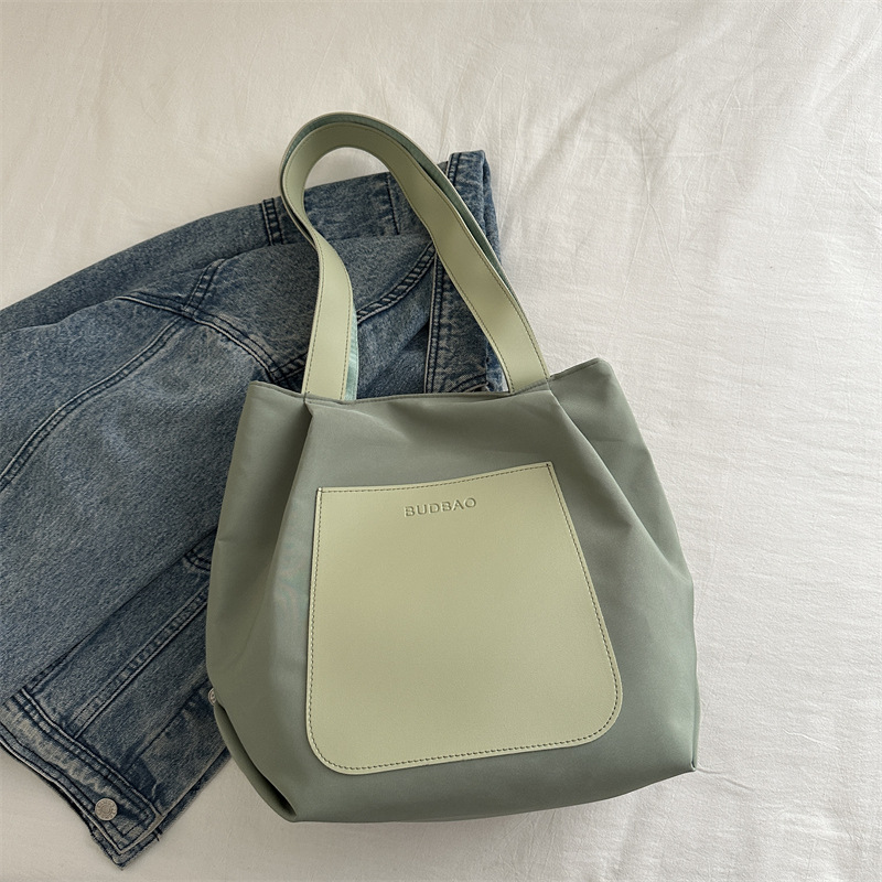 Bolso de mano simple 2024 invierno nuevo bolso de ocio versátil ains este año, bolso de hombro coreano para mujeres