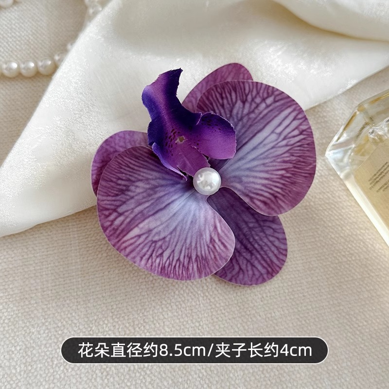 Puramente deseoso de viento colorido primavera orquídea mariposa broca de flores laterales flores simuladas tocado de flores al por mayor acrobacias para el pelo de viajes al mar