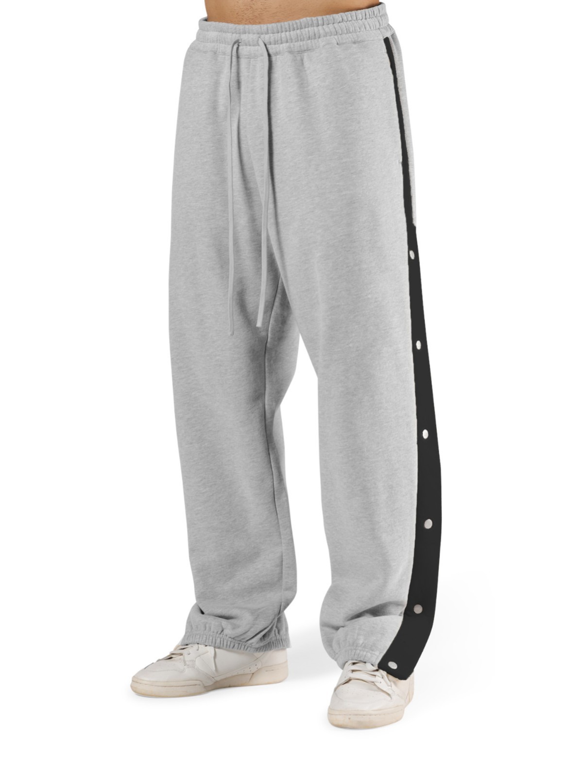 Los deportes de otoño e invierno de los músculos locos están completamente abiertos con hebillas y pantalones de terciopelo. los hombres están relajados y relajados. los pies están atados en otoño e invierno y los pantalones deportivos de terciopelo.