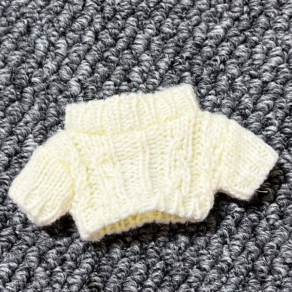White twisting sweater