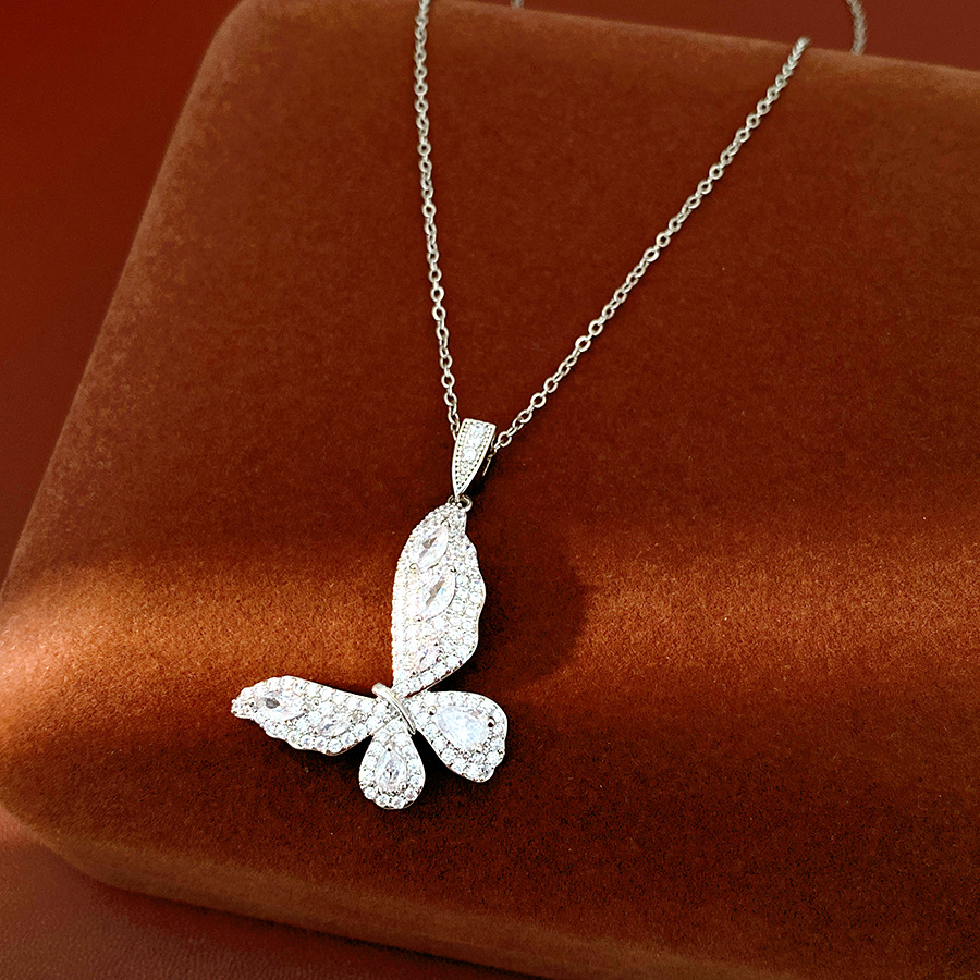 Collar de mariposa de piedra púrpura ligero de lujo nicho cadena de clavícula de alta calidad temperamento de moda conjunto de joyería versátil